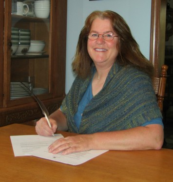 pegg-signing-contract-4-10-22-17.jpg